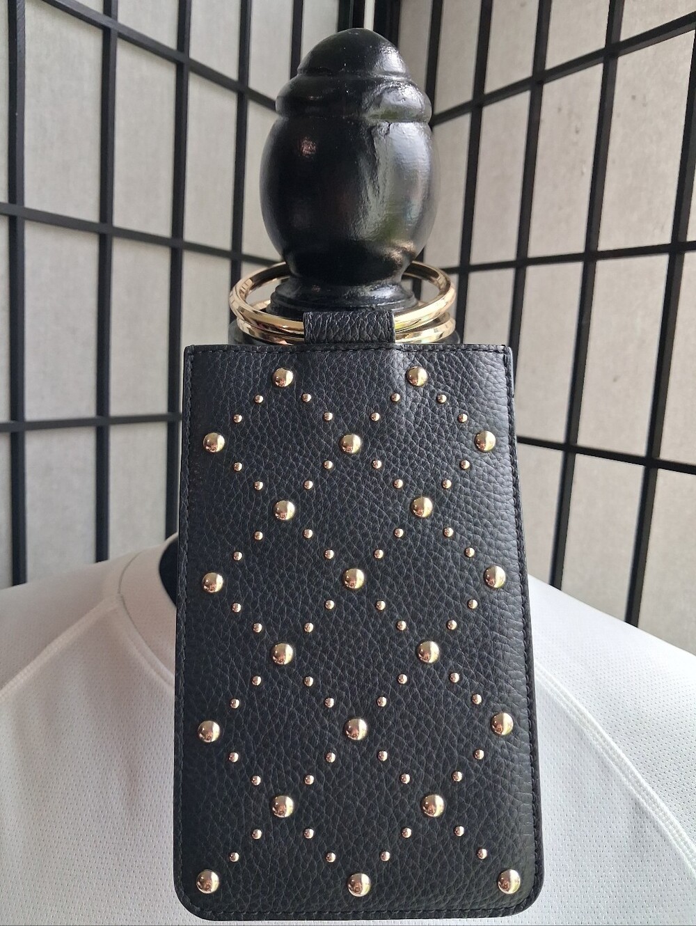KATE SPADE BLACK with GOLD STUDS WRISTLET PHONE CASE & BL. & WH. STRIPES  Inside